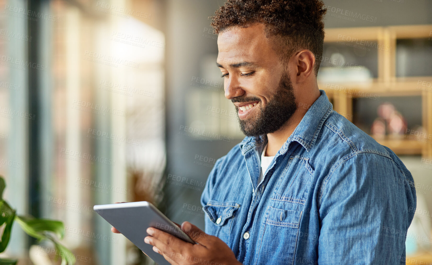 Buy stock photo Happy, man and remote work with tablet at house for research, proofreading and review grammar. Smile, male person and digital for editing article, fact checking and freelancer with copywriting report