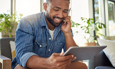 Buy stock photo Man, remote work and reading with tablet at house for research, proofreading and review grammar. Smile, male person and digital for editing article, fact check and freelancer with copywriting report