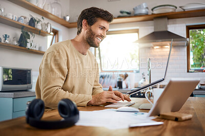 Buy stock photo Smile, man and typing with laptop at house for research, finance report and online banking. Happy, male person and pc for budget review, loan application and payment for household expenses in kitchen