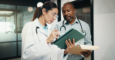 Buy stock photo Meeting, reading or doctors with tablet in hospital, care plan assistance or medical case discussion. Consulting, physician or mature people with medicine report for treatment help, tech or teamwork