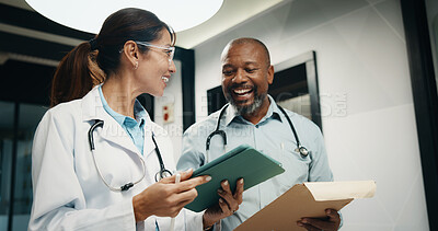 Buy stock photo Discussion, laugh or doctors with tablet in hospital, healthcare advice or medical case assistance. Consulting, happy or mature people with telehealth report for treatment help, tech or funny team