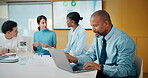 Businessman, research and laptop in office with meeting, stats and risk assessment for insurance agency. Manager, person and team with computer, data analysis and graphs for planning cost of policy.
