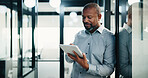 Typing, black man and tablet in office for company report, finance or revenue service. Mature, businessman or accountant with digital tech for project management, investor contact and research