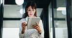 Woman, lawyer and reading with tablet in office for research, court case and review evidence. Smile, mature attorney and digital with witness testimony, corporate lawsuit and confidential information
