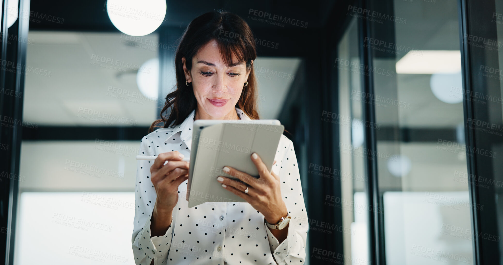 Buy stock photo Woman, lawyer and reading with tablet in office for research, court case and review evidence. Smile, mature attorney and digital with witness testimony, corporate lawsuit and confidential information