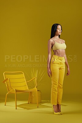 Buy stock photo Thinking, fashion or woman with cosmetics in studio, amber eyeshadow or trendy clothes for chic style. Summer aesthetic, bold color or person with creative wardrobe idea, makeup or yellow background
