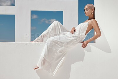 Buy stock photo Woman, fashion and relax on wall with makeup, thinking or designer white dress for contemporary style. Artistic, person and creative vision outdoor with beauty cosmetics, outfit and unique aesthetic.