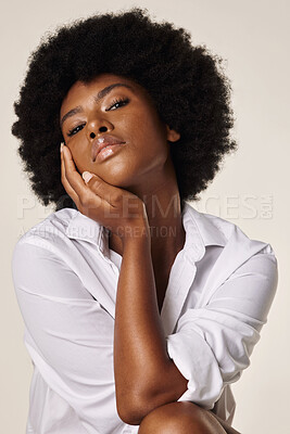 Buy stock photo Beauty, glow and portrait of black woman in studio for hair care care, glow cosmetics and hydration. Touch, afro hairstyle and growth with person on white background for wellness and natural texture