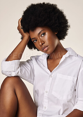 Buy stock photo Beauty, hair care and portrait of black woman in studio for selfcare, shampoo and hydration. Shine, Afro hairstyle and growth with person on white background for wellness and natural texture