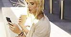 Coffee, business and woman with phone in city for text message, social media update or communication. Mobile, drink and worker outdoor for chat, post and internet connection with wind in morning