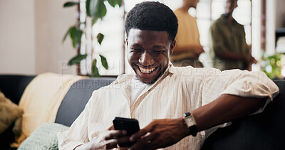 Buy stock photo Relax, black man and laughing with phone on sofa for funny online video, comic notification or texting. Happy, person and smartphone in home for social media meme, internet browsing and weekend break