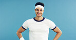 Portrait, smile and tennis with man on studio space for health, retro sports or wellness. Confidence, fitness and proud with happy person on blue background for competition, game or hobby as player