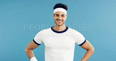 Buy stock photo Portrait, smile and tennis with man on studio space for health, retro sports or wellness. Confidence, fitness and proud with happy person on blue background for competition, game or hobby as player