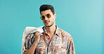 Fashion, portrait and sunglasses with man on blue background for holiday clothing or retro aesthetic. Shades, space style with person in studio for summer travel or vacation apparel and clothes