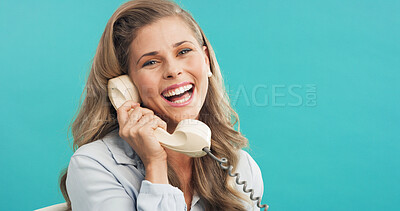 Buy stock photo Funny, woman and telephone call in studio for business joke, admin and talk with mockup space. Retro landline, portrait and secretary laughing, chat and schedule appointment on blue background