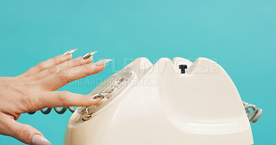 Buy stock photo Woman, hands and rotary dial with telephone in studio for retro phone call on a blue background. Female person, dialer and communication with number crank or vintage technology for antique landline