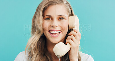 Buy stock photo Business, woman and telephone call in studio for funny joke, admin and talking with contact. Retro landline, portrait and secretary laughing, conversation and schedule appointment on blue background