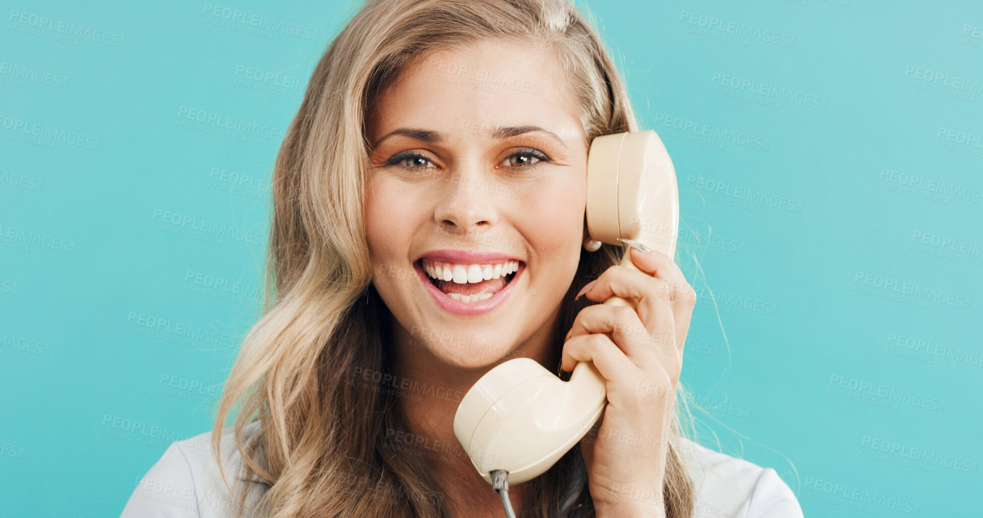 Buy stock photo Business, woman and telephone call in studio for funny joke, admin and talking with contact. Retro landline, portrait and secretary laughing, conversation and schedule appointment on blue background