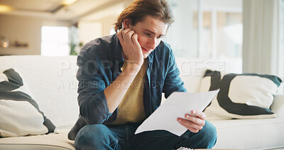 Buy stock photo Documents, thinking and man with stress on sofa for financial decision, planning or loan application. Worried, letter and person with doubt for paperwork of account, mortgage or debt problem in home