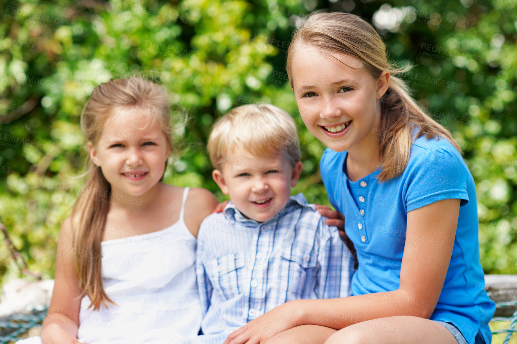 Buy stock photo Family, children and portrait in park with love, sibling care and relationship development with smile. Boy, sisters and outdoor with happiness for support, bonding and together for summer holiday