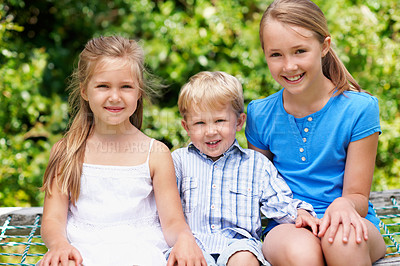 Buy stock photo Siblings, children and happy portrait in garden for bonding together, healthy growth or connection. Love, brother and sisters with smile outdoor for relationship development, support or weekend break
