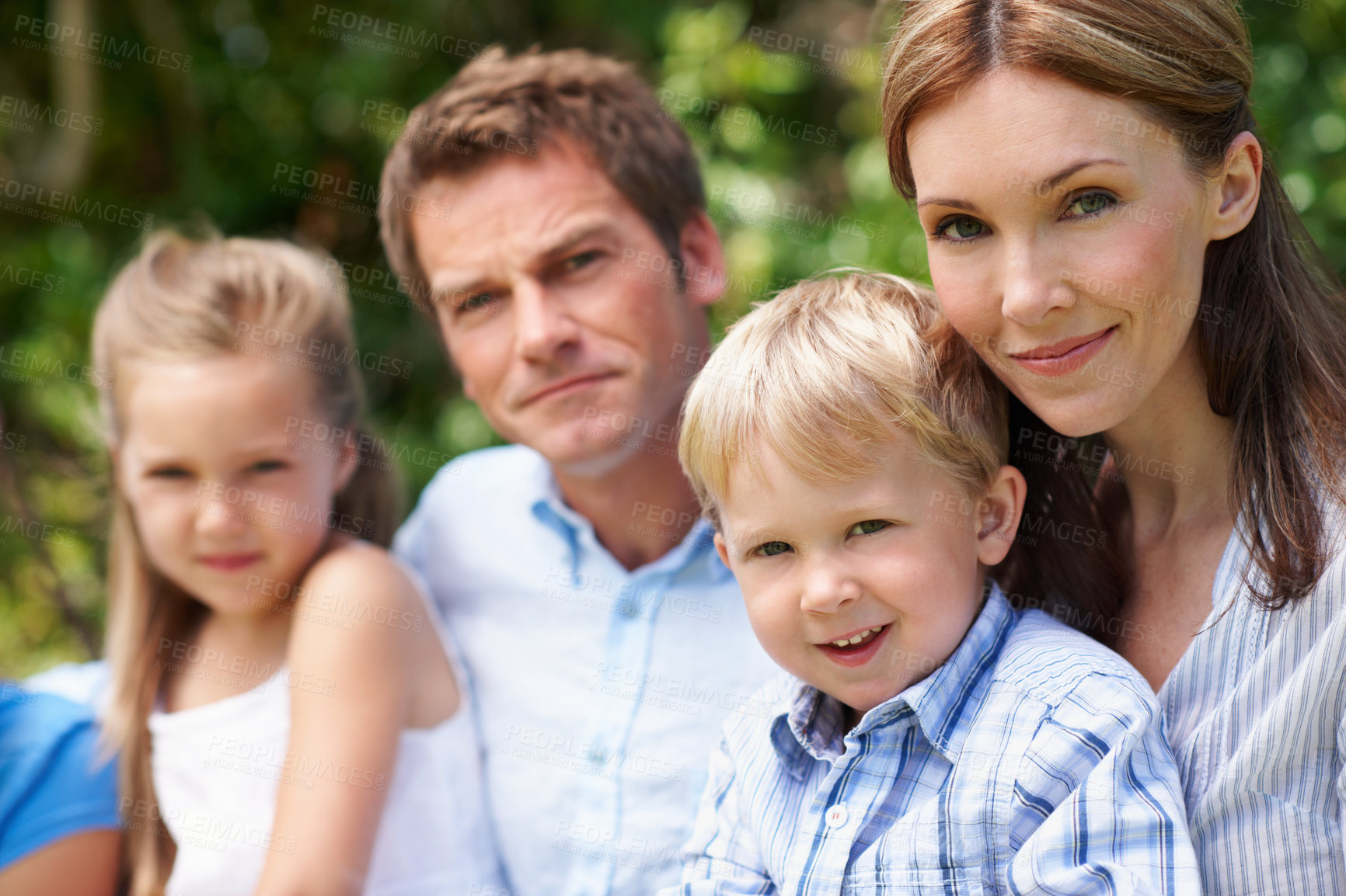Buy stock photo Parents, children and portrait in garden with smile, relationship development and love in summer. Outdoor, happy people and siblings in nature park with support, family wellness and trust with care