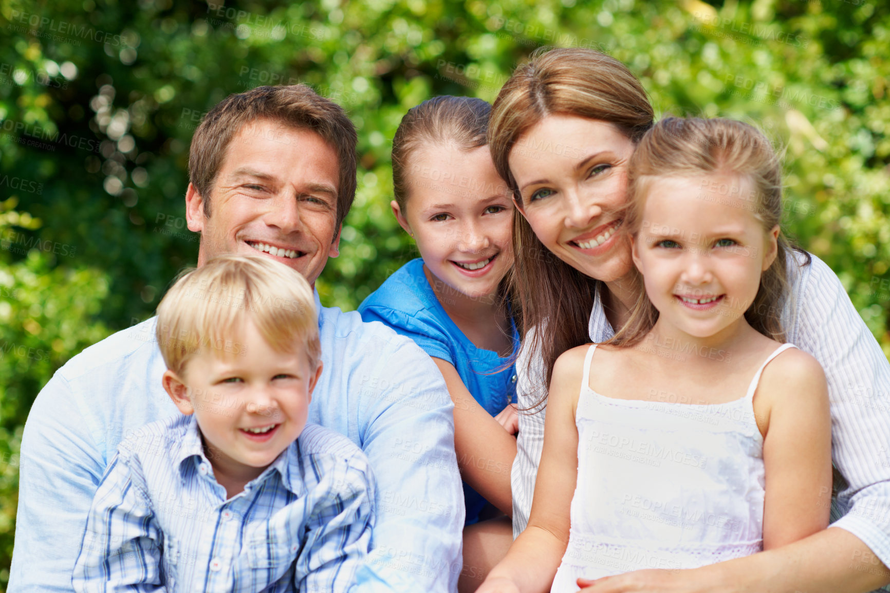 Buy stock photo Portrait, smile and summer with family outdoor together for bonding, love or support. Backyard, relax or security with mom, dad and sibling children in garden of home for break, connection or growth