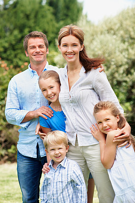 Buy stock photo Parents, children and happy portrait at park for bonding together, holiday break and relationship. Love, people and kids with smile in nature for family hug, connection and support on weekend outing