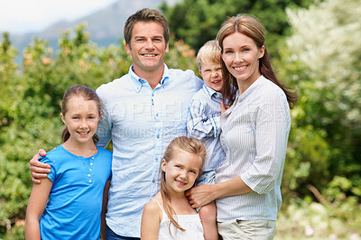 Buy stock photo Portrait, parents and happy with children outdoor for love, parent support and bonding together. Smile, people and affection with kids, family connection and weekend break on vacation trip in nature