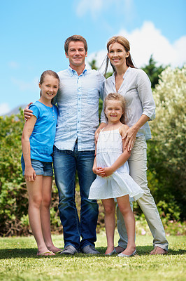 Buy stock photo Parents, children and portrait in garden for love, relationship development and smile in summer. Outdoor, happy people and sisters in nature park with support, family wellness and trust with care