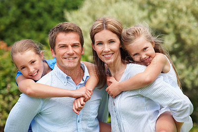 Buy stock photo Smile, parents and piggyback children in nature for love, parental support and bonding on holiday. Portrait, people and embrace kids with affection, family connection and playful fun on vacation trip