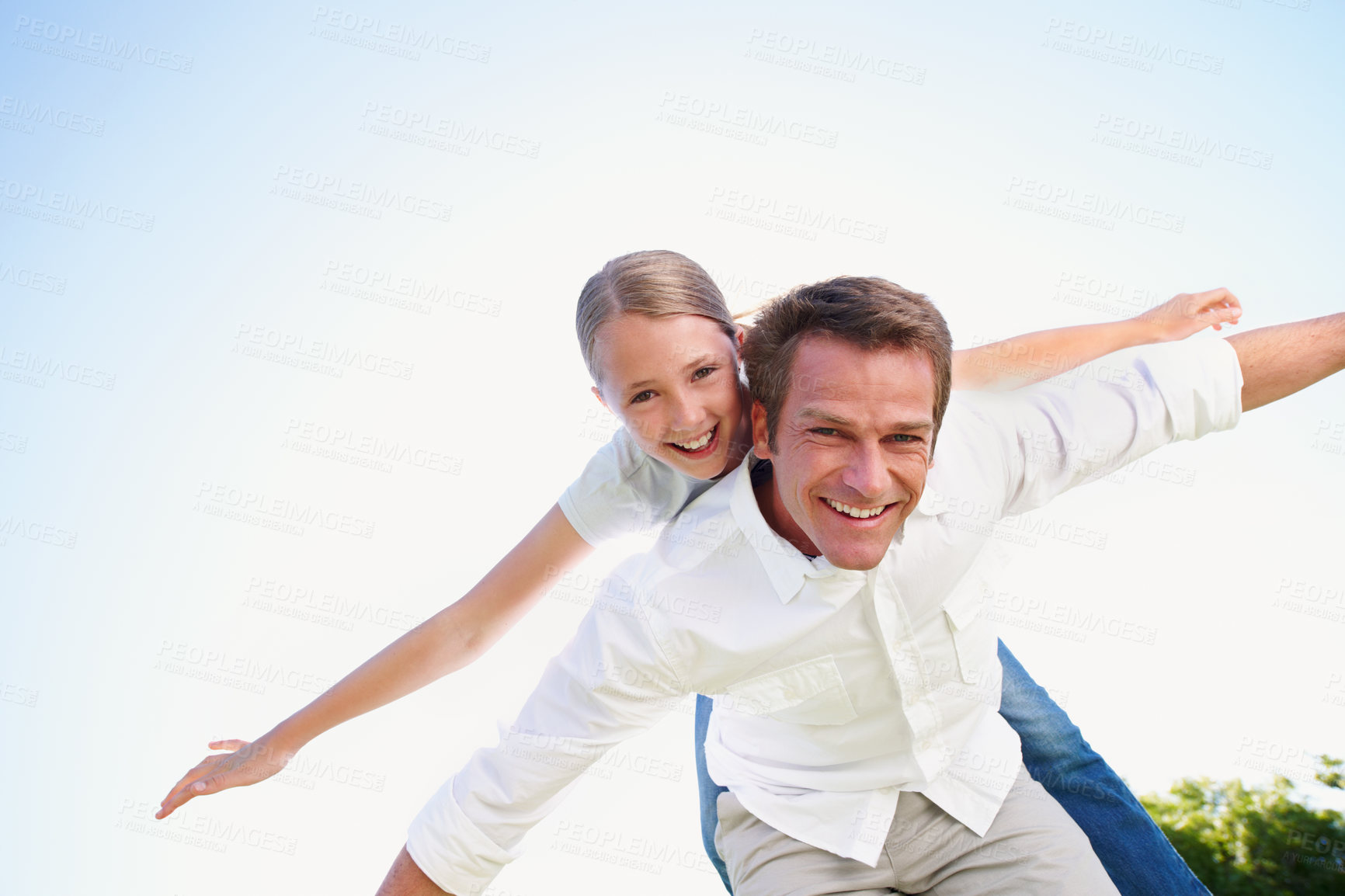 Buy stock photo Portrait, father and piggyback with daughter in air for fun activity, airplane games and holiday. Space, below and fantasy flying with family, parental support and weekend break on vacation in nature