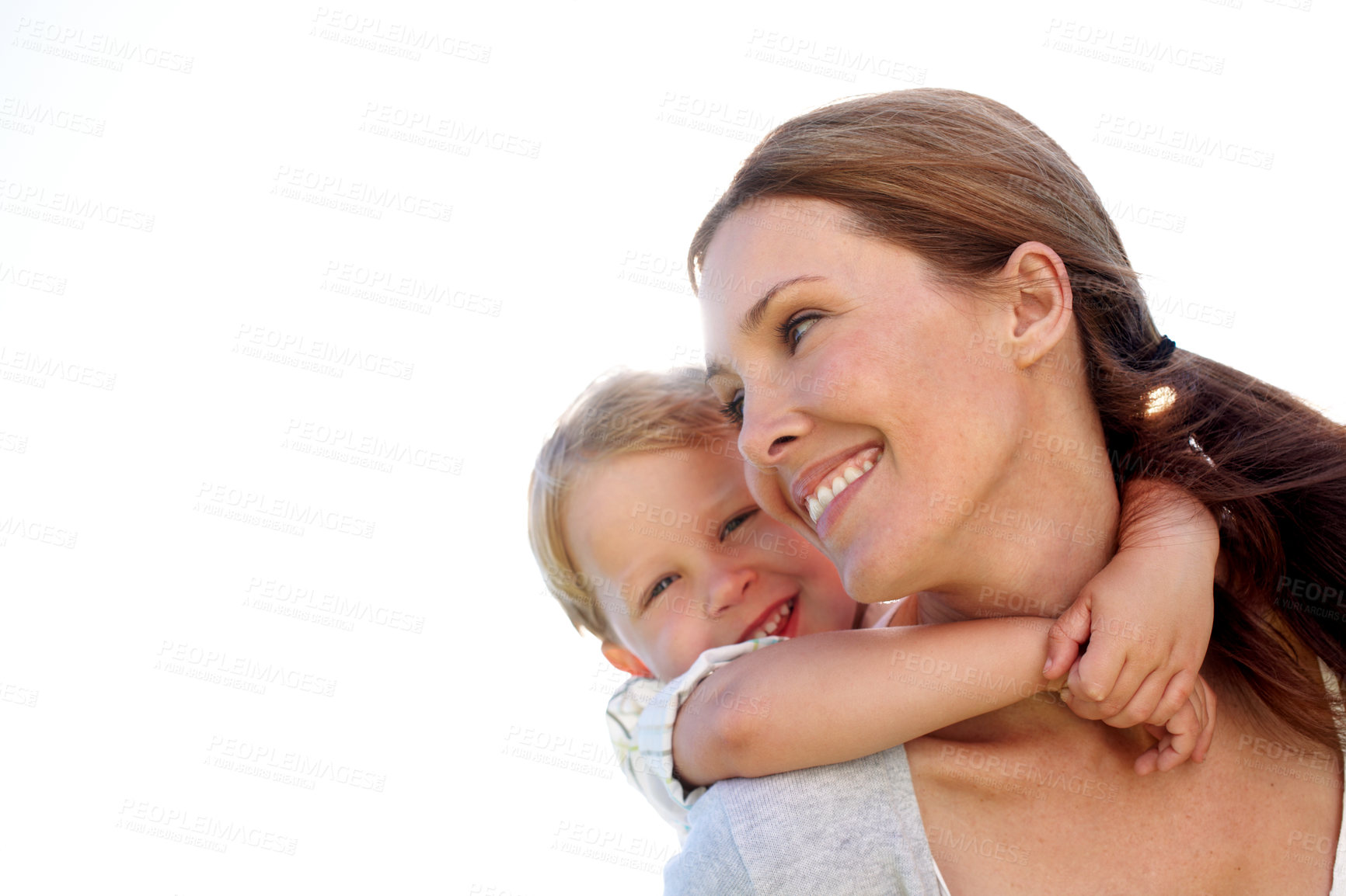 Buy stock photo Mom, child and bonding with piggyback in studio for family time or love on a white background. Mother, kid or son with smile, hug or embrace for back ride, fun vacation or weekend together on space