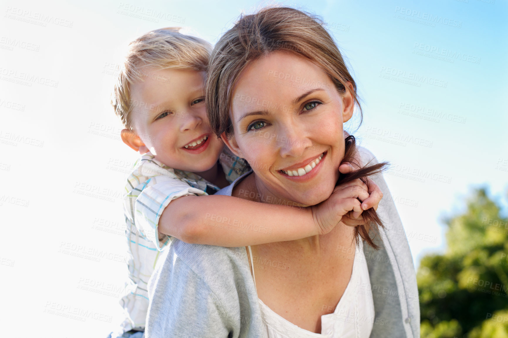 Buy stock photo Mother, kid and piggyback portrait at park for bonding together, healthy relationship or support. Happy family, woman and carry boy child in nature for affection, love connection or trust on weekend