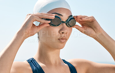 Buy stock photo Confident, swimmer and woman with goggles for fitness, wellness and competition or tournament. Ready, vision and athlete or person with gear for practice, training and cardio for outdoor sports
