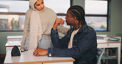 Buy stock photo Talking, teacher and student with guidance for education, development or study at university. Advice, conversation and woman speaking to man in classroom of college for feedback, help or support