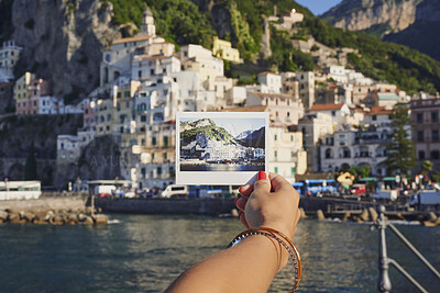 Buy stock photo Travel, retro or hand in town with picture, building photography or sightseeing moment on trip. Tourism, film or woman outdoor with vintage print, vacation memory or architecture capture in Italy.