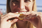 Portrait of funny girl eating lemon
