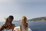 Beautiful girl friends travel on speed boat to paradise island for relaxing nature tourist destination vacation discover explore