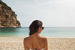 Beautiful woman in bikini on beach paradise enjoyment of healthy travel vacation