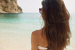 Beautiful woman in bikini on beach paradise enjoyment of healthy travel vacation