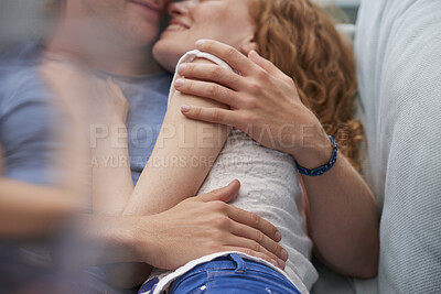 Buy stock photo Couple, smile and relax on sofa together for hug, comfort and support with connection in home. Man, woman and cuddle for rest, commitment and partner with embrace for love in living room of house