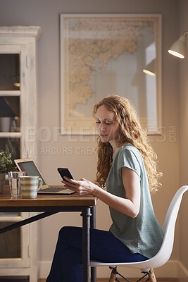 Buy stock photo Texting, online and woman with phone in home office, reading and communication with contact on break. Typing, message and person with mobile for chat, remote work and networking with tech in house