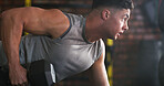 Fitness, weight training or man in center with dumbbell, power or renegade row in bodybuilding. Exercise, sweat or person in gym with equipment, intense workout or strength in muscle development.