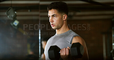 Buy stock photo Fitness, serious and man with weights in gym, strength challenge and routine for muscle development. Bodybuilding, bicep training and athlete with dumbbell in sports club, strong and intense exercise
