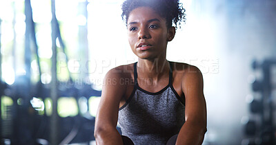Buy stock photo Relax, tired and woman in gym for fitness break, wellness and recovery from body building exercise. Serious, athlete and person in health club for muscle rest, breathing and fatigue for challenge