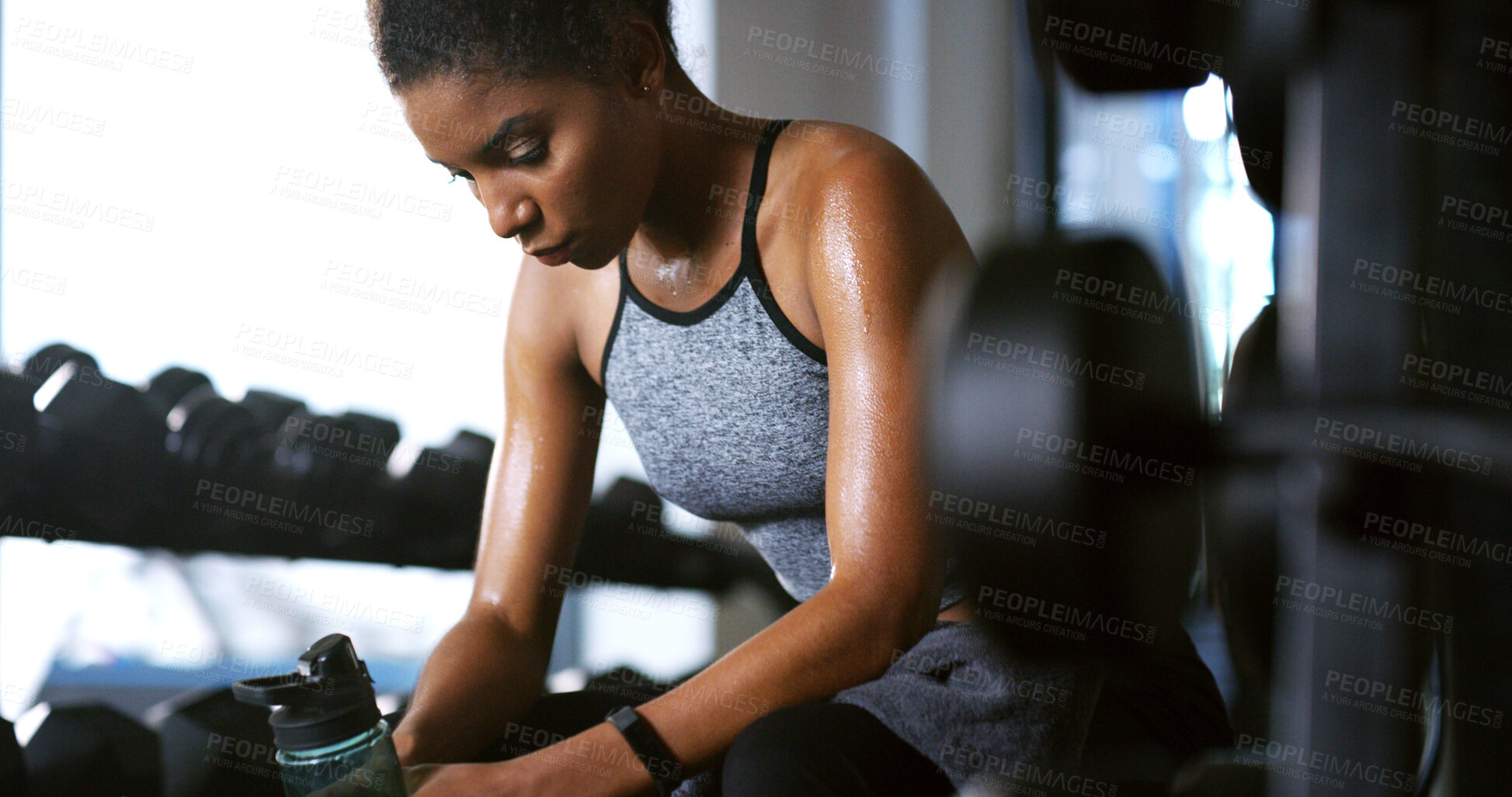 Buy stock photo Fitness, water and tired woman in gym, rest and thinking of intense training recovery for wellness. Hydration, sweat and African person with fatigue in exercise club, reflection or relax to cool down