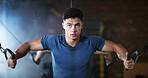 Fitness, man and cable weight machine in gym, workout and resilience training for strength challenge. Sports club, equipment and athlete with anaerobic exercise for wellness, serious and muscle gain