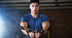 Workout, man and cable weight machine in gym, fitness and resilience training for strength challenge. Sports club, equipment and athlete with anaerobic exercise for wellness, serious and muscle gain
