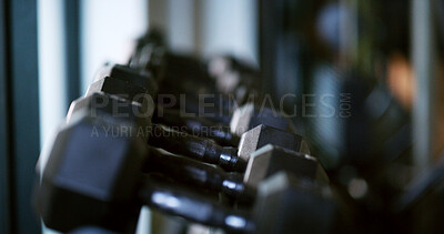 Buy stock photo Fitness, rack or dumbbells in gym for weightlifting, closeup or weight set for bodybuilding. Wellness, training setup or metal equipment for workout, exercise selection or development tools in center